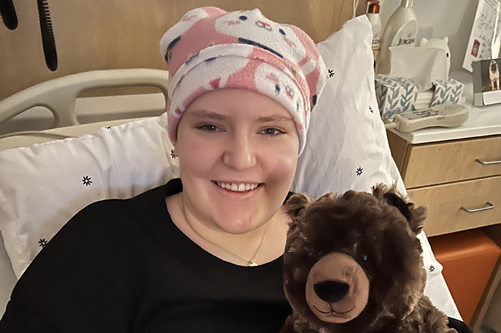 Maggie in hospital bed
